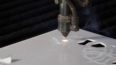 Laser cutting designed parts from plastic glass Stock Footage 82727689