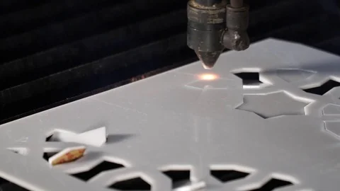 Laser cutting designed parts from plastic glass Stock Footage 82727799