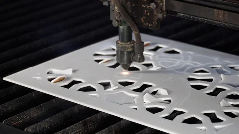 Laser cutting designed parts from plastic glass Stock Footage 82727967