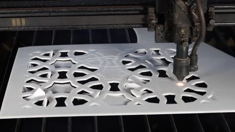 Laser cutting designed parts from plastic glass Stock Footage 82727972