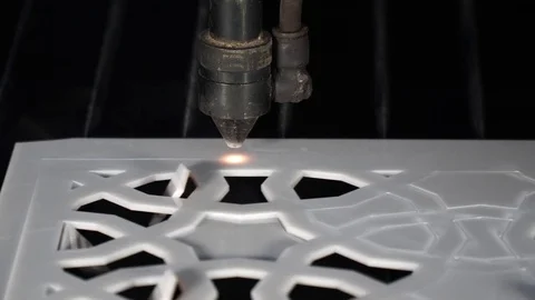 Laser cutting designed parts from plastic glass Stock Footage 82728126