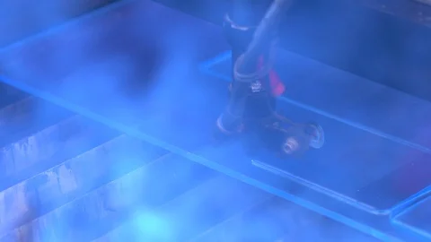 Laser cutting machine carving patterns on the plastic plate Stock Footage 119398186