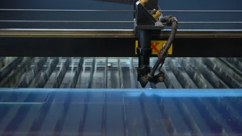 Laser cutting machine carving patterns on the plastic plate Stock Footage 119398198