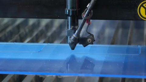 Laser cutting machine carving patterns on the plastic plate Stock Footage 119398203