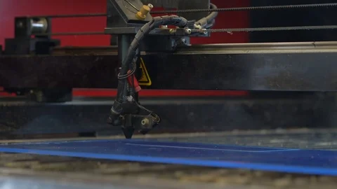 Laser cutting machine carving patterns on the plastic plate Stock Footage 119398238