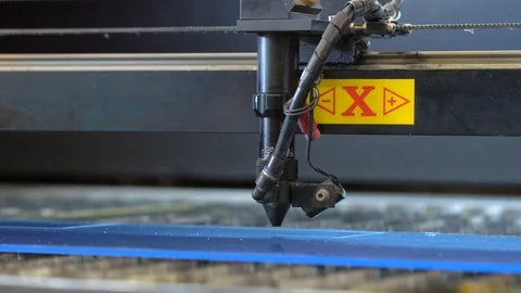 Laser cutting machine carving patterns on the plastic plate Stock Footage 119398246