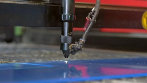 Laser cutting machine carving patterns on the plastic plate Stock Footage 119398256