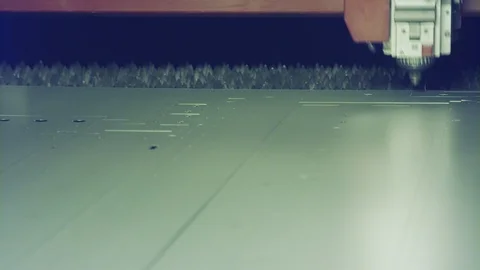 Laser cutting machine cutting a large metal sheet Stock Footage 100470156