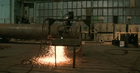 Laser cutting machine cutting through steel Stock Footage 129850285