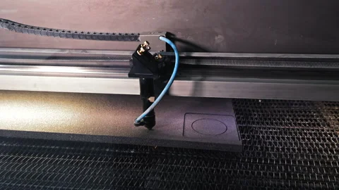 Laser cutting machine engraving foam material. Close-up of an industrial laser Stock Footage 311304244