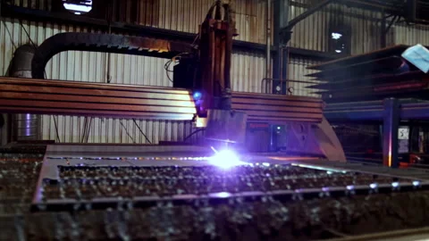 Laser cutting machine in a factory producing metal parts Stock Footage 292328360