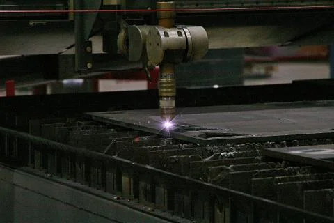Laser cutting machine in an metal factory. Stock Photos