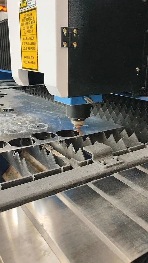 Laser cutting machine Working process laser cutting Powerful laser beam Vertical Stock-Footage 324979192