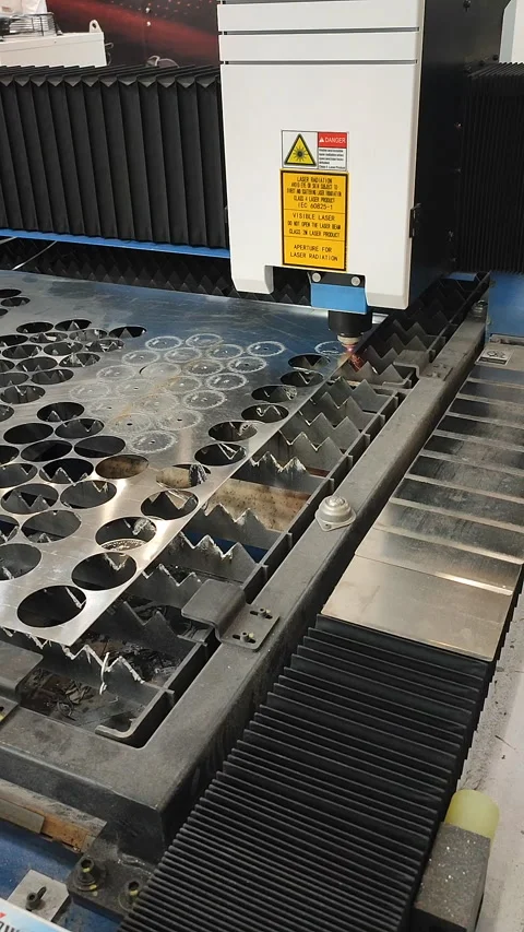 Laser cutting machine Working process laser cutting Powerful laser beam Vertical Stock Footage 324989395