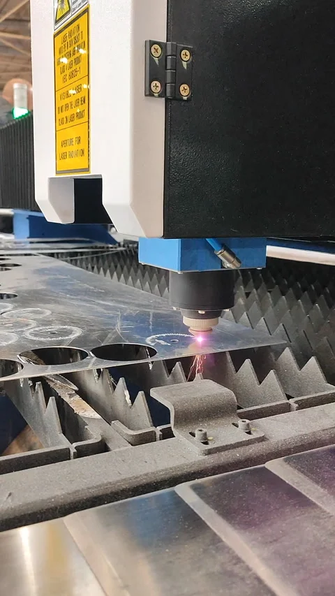 Laser cutting machine Working process laser cutting Powerful laser beam Vertical Stock Footage 324989407