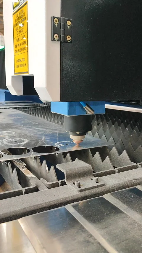 Laser cutting machine Working process laser cutting Powerful laser beam Vertical Stock Footage 324989483