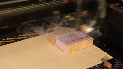 Laser cutting machine working on wooden product Video stock 265288725