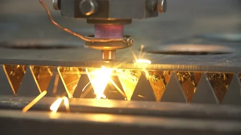 Laser cutting metal sheet with bright sparkles Stock Footage 169358974