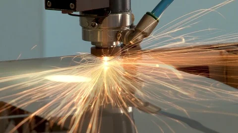 Laser cutting of metal sheet from titanium alloys on installation. Stock Footage 109129163