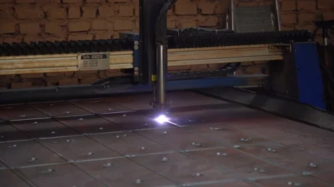 Laser cutting metal in the workshop close-up. Powerful laser makes hole in metal 스톡 동영상 233913039