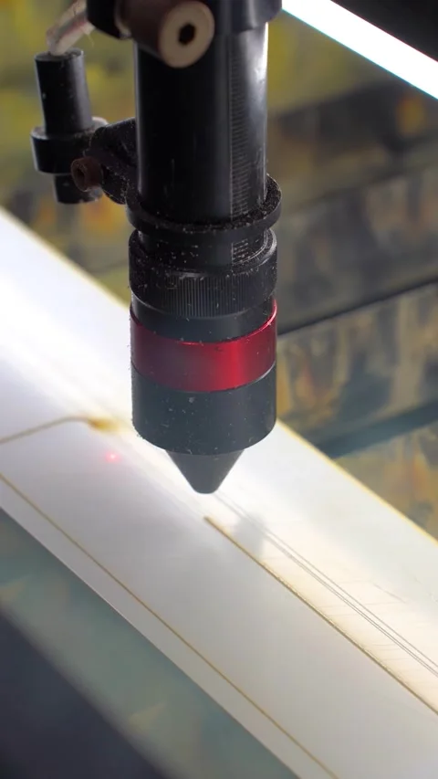 Laser cutting pattern in plastic mold. Vertical video. Stock Footage 292876371