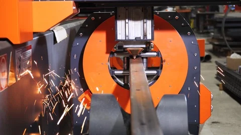 Laser cutting process, making a hole in metal tube. Industrial CNC machine Stock Footage 122812446