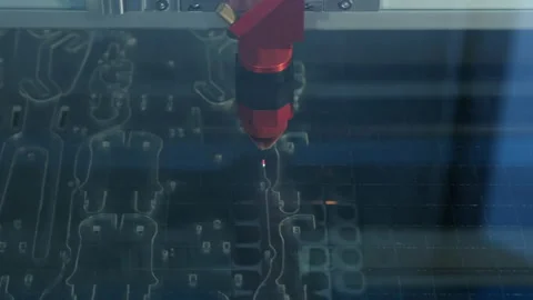 Laser Cutting Shapes in Plexiglas Panel Stock Footage 147748560