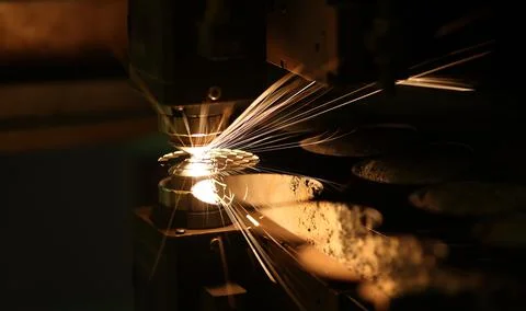 Laser cutting technology flat sheet metal steel material processing with sparks Foto stock