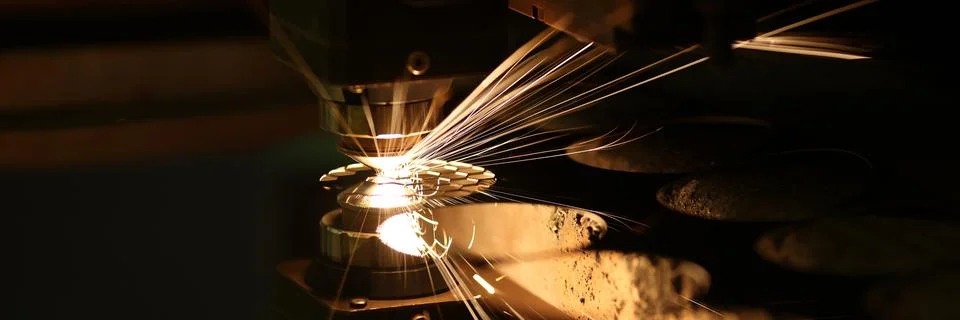 Laser cutting technology flat sheet metal steel material processing with sparks Foto stock