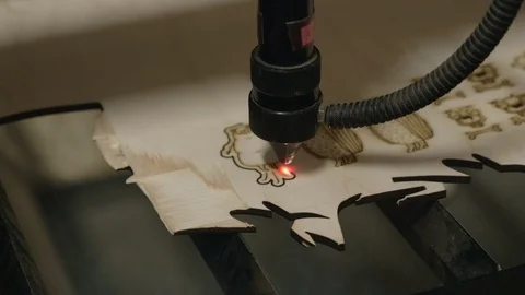 Laser cutting on wood Stock Footage 73889885