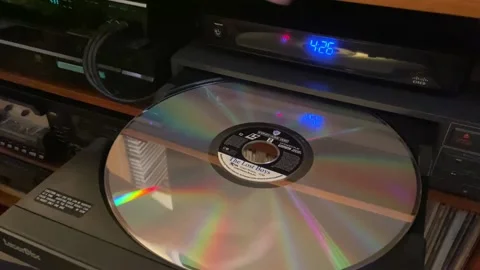 Laser Disc Closeup Old Technology Vídeos de archivo 163055585