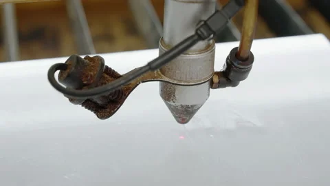 Laser engraves on work surface close up. Using robots to optimize workflow Stock Footage 238540700