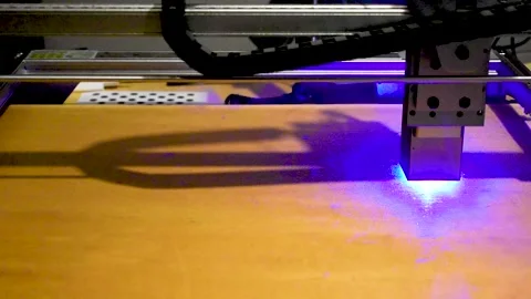 Laser engraving and cutting, using reclaimed wood, upcycling concept Stock Footage 295997294