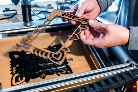 Laser engraving and cutting, using reclaimed wood, upcycling concept 스톡 사진