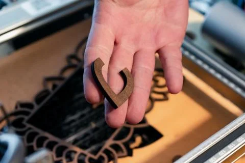 Laser engraving and cutting, using reclaimed wood, upcycling concept Stock Photos