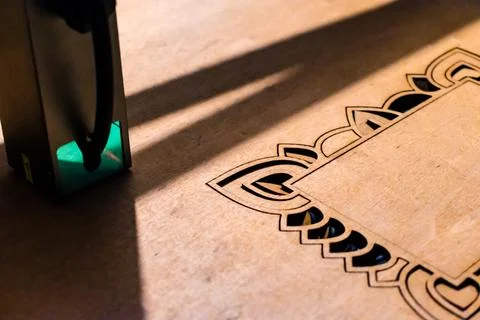 Laser engraving and cutting, using reclaimed wood, upcycling concept Fotos Stock