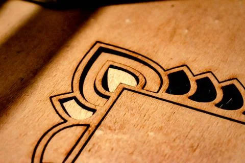 Laser engraving and cutting, using reclaimed wood, upcycling concept 写真素材