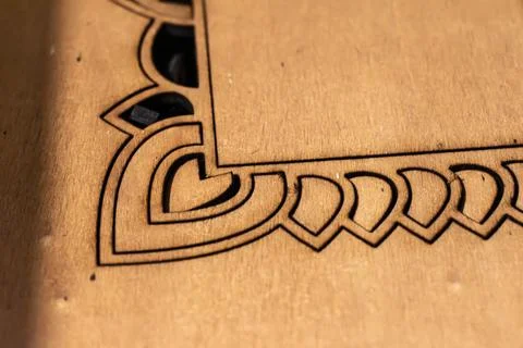 Laser engraving and cutting, using reclaimed wood, upcycling concept Stock Photos