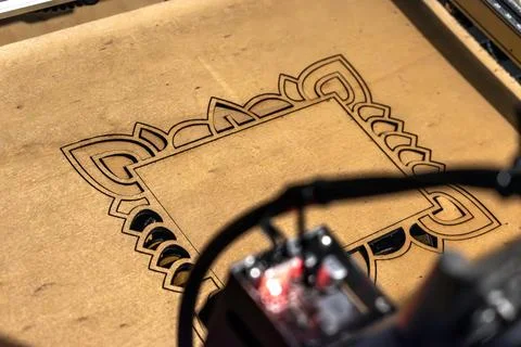 Laser engraving and cutting, using reclaimed wood, upcycling concept Stock Photos