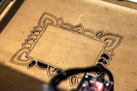 Laser engraving and cutting, using reclaimed wood, upcycling concept Stock Photos