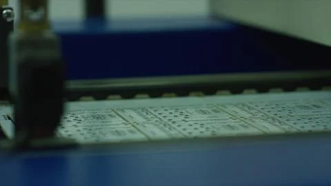 Laser engraving machine working on electronic circuit boards in factory Stock Photos