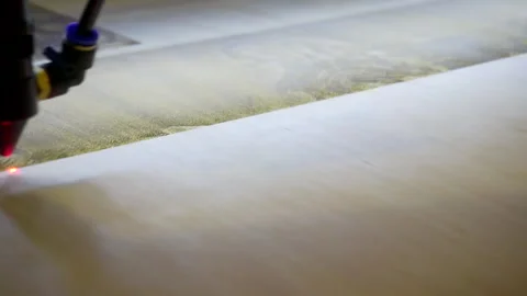 Laser engraving on wood. Laser printer moves on a wooden surface. 库存影片 142018041