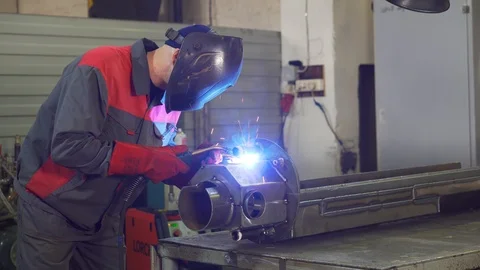 Laser high-temperature welding, sparks, workers duties, glasses for welding Stock Footage 120063176