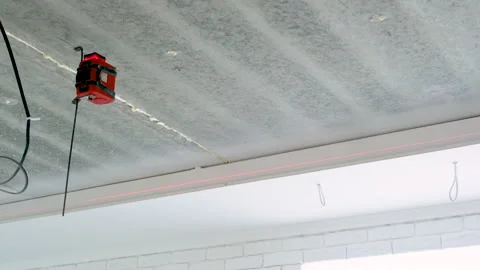 Laser level on the ceiling. Selective focus. Stock Footage 152161301