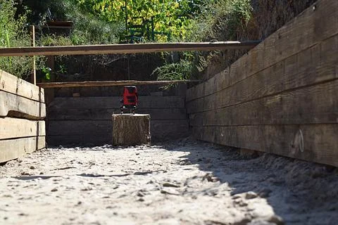 Laser level in a trench with formwork. Stock Photos