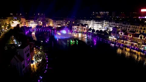 Laser light show at night over Love Lake in Phu Quoc Island. High panoramic Stock Footage 293039928
