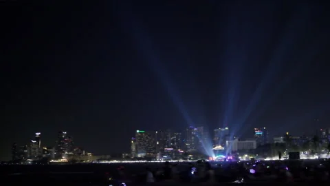 Laser Light Show Over Cityscape With Crowds In Pattaya Chonburi Thailand Wi.. Video stock 337999532