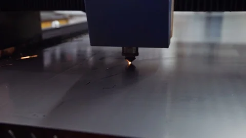 The laser machine cuts metal very quickly. Stock Footage 108648422