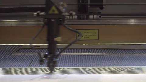 Laser machine for cutting fabric, leather, and other non-metallic materials Stock Footage 118565178