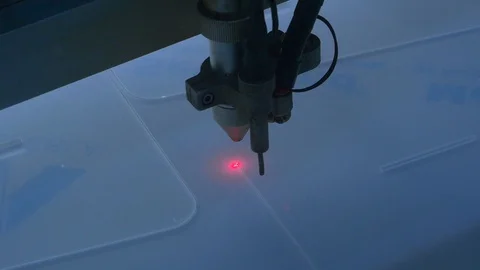 Laser machine preparing plexiglas for reopening of public places Stock-Footage 129557997